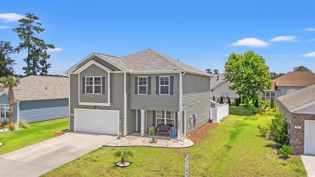 190 Belmonte Dr, Myrtle Beach, SC 29588 - view of front facade with a garage, driveway, and a front lawn