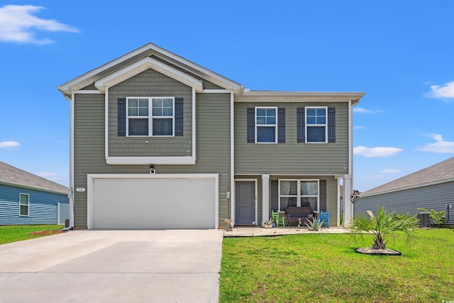 190 Belmonte Dr, Myrtle Beach, SC 29588 - view of front of property with an attached garage, driveway, a front lawn, and covered porch
