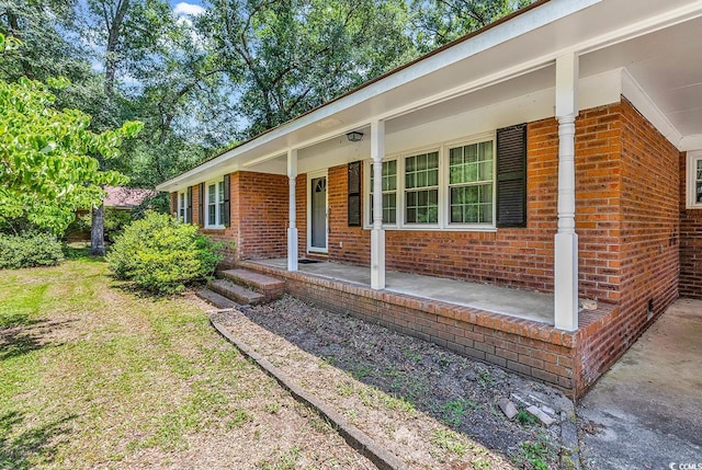 823 Bellamy Ave, Murrells Inlet, SC 29576 - view of front of property with covered porch and brick siding