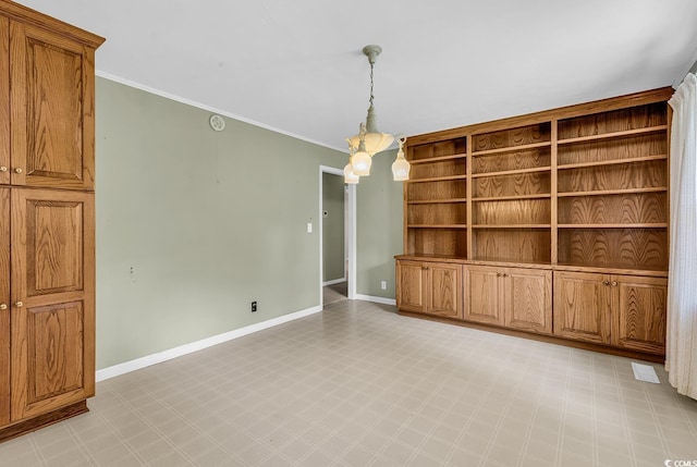 823 Bellamy Ave, Murrells Inlet, SC 29576 - unfurnished room featuring light floors, ornamental molding, and a chandelier
