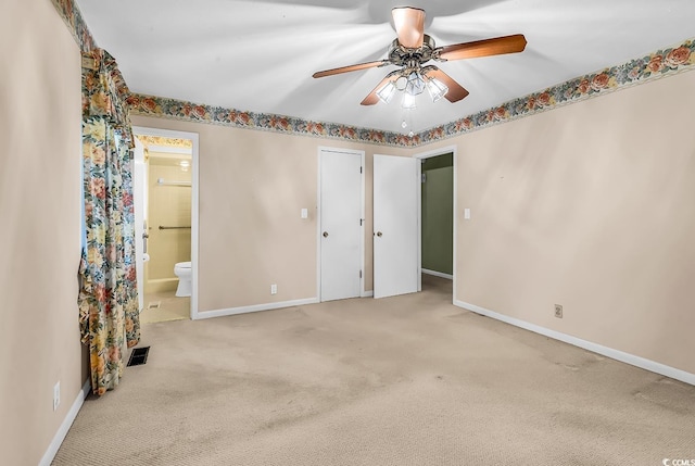 823 Bellamy Ave, Murrells Inlet, SC 29576 - unfurnished bedroom with carpet flooring, ensuite bathroom, and a ceiling fan