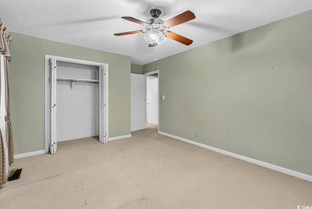 823 Bellamy Ave, Murrells Inlet, SC 29576 - unfurnished bedroom featuring light carpet, a closet, and ceiling fan