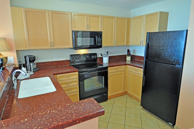 3500 N Ocean Blvd Unit 701-702, North Myrtle Beach, SC 29582 - kitchen featuring black appliances, light brown cabinetry, dark countertops, and light tile patterned floors