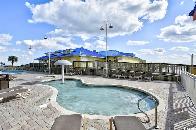 3500 N Ocean Blvd Unit 701-702, North Myrtle Beach, SC 29582 - community pool featuring a patio