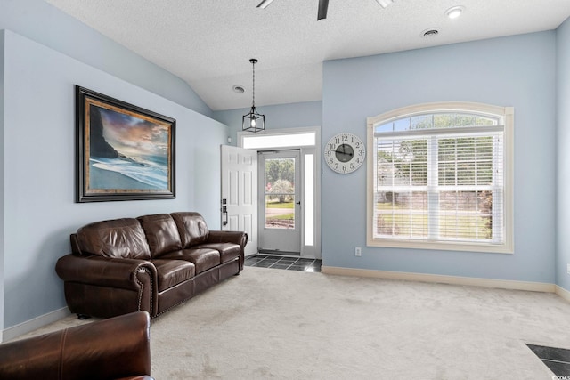 4162 Dupree Dr, Little River, SC 29566 - living area featuring carpet floors, ceiling fan, lofted ceiling, and a textured ceiling