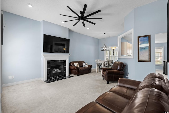4162 Dupree Dr, Little River, SC 29566 - living room with carpet floors, a ceiling fan, a tiled fireplace, and recessed lighting