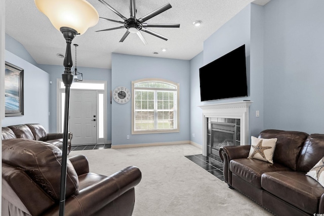 4162 Dupree Dr, Little River, SC 29566 - carpeted living area featuring a fireplace and ceiling fan