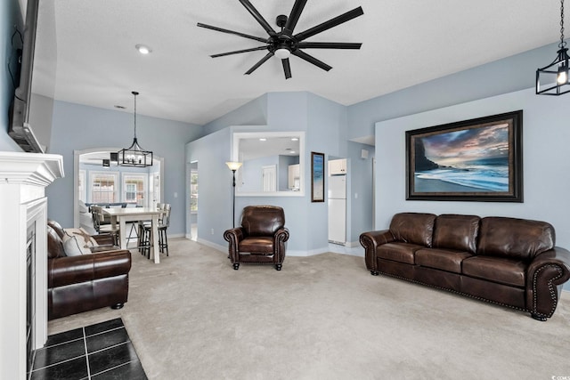 4162 Dupree Dr, Little River, SC 29566 - carpeted living area featuring ceiling fan, a fireplace, recessed lighting, and a chandelier