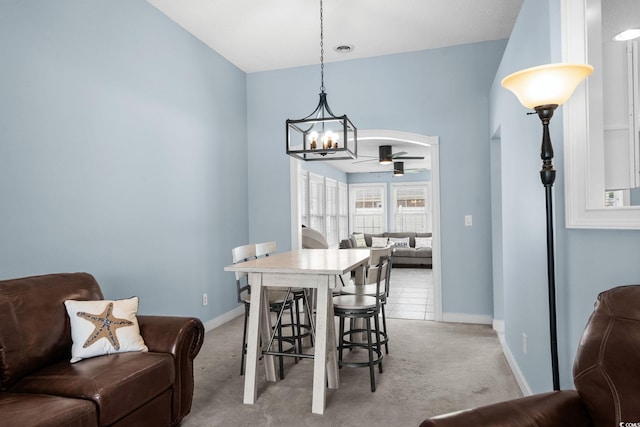 4162 Dupree Dr, Little River, SC 29566 - dining area featuring a chandelier, light carpet, and ceiling fan