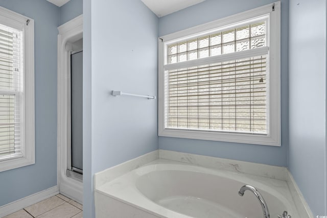4162 Dupree Dr, Little River, SC 29566 - bathroom with a garden tub, healthy amount of natural light, tile patterned floors, and a shower