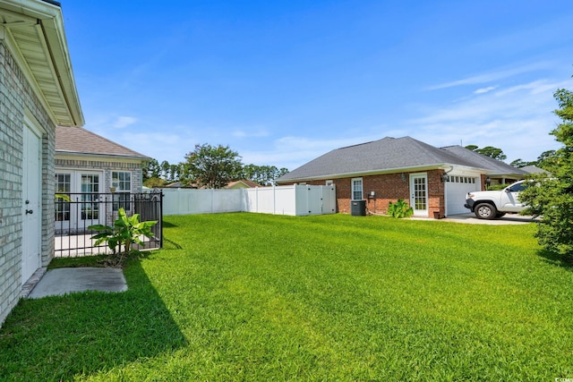 4162 Dupree Dr, Little River, SC 29566 - fenced yard featuring an attached garage