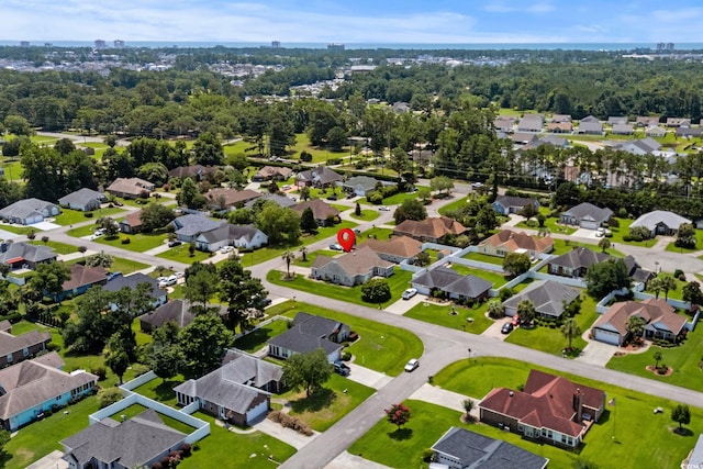 4162 Dupree Dr, Little River, SC 29566 - aerial perspective of suburban area featuring a tree filled landscape