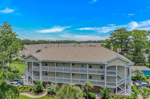 4173 Hibiscus Dr Unit 103, Little River, SC 29566 - back of property featuring a shingled roof