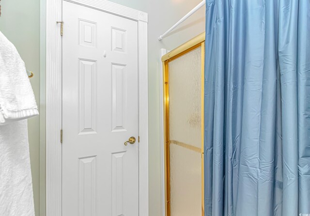 4173 Hibiscus Dr Unit 103, Little River, SC 29566 - full bathroom featuring a shower with shower curtain
