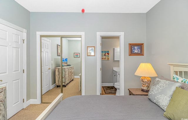 4173 Hibiscus Dr Unit 103, Little River, SC 29566 - bedroom featuring carpet flooring, a closet, and ensuite bath
