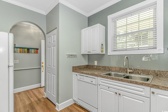 4173 Hibiscus Dr Unit 103, Little River, SC 29566 - kitchen featuring white appliances, light wood-style flooring, crown molding, white cabinetry, and arched walkways