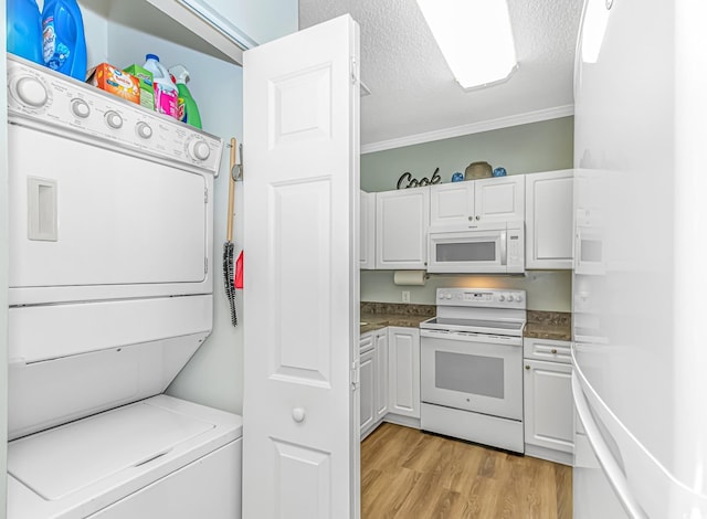 4173 Hibiscus Dr Unit 103, Little River, SC 29566 - laundry room with estacked washer and dryer, light wood-type flooring, a textured ceiling, and crown molding