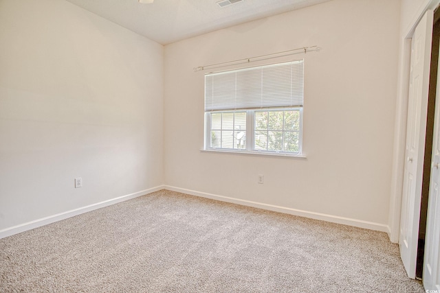 1409 Ashwood Cir, Surfside Beach, SC 29575 - carpeted empty room with baseboards