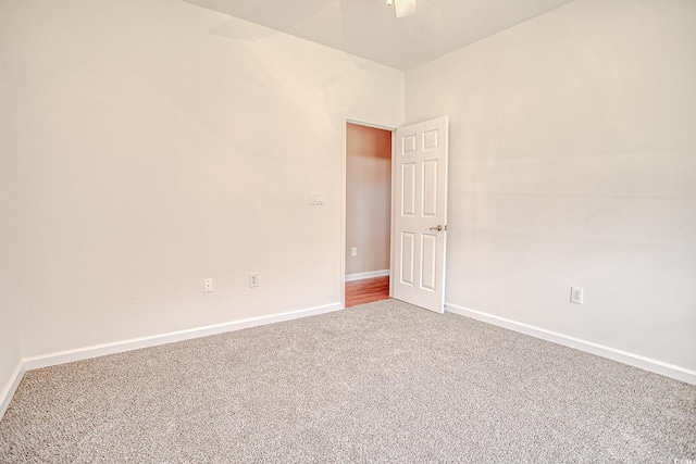 1409 Ashwood Cir, Surfside Beach, SC 29575 - empty room featuring carpet flooring and a ceiling fan