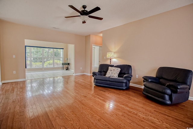1409 Ashwood Cir, Surfside Beach, SC 29575 - living room featuring hardwood / wood-style flooring and ceiling fan