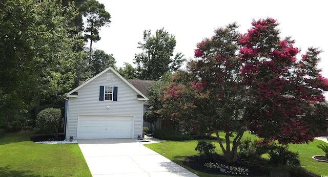 1409 Ashwood Cir, Surfside Beach, SC 29575 - traditional-style house with driveway, a garage, and a front lawn