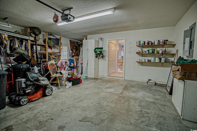 1409 Ashwood Cir, Surfside Beach, SC 29575 - garage featuring a garage door opener and electric panel