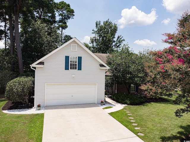 1409 Ashwood Cir, Surfside Beach, SC 29575 - traditional home with driveway, a front lawn, and an attached garage