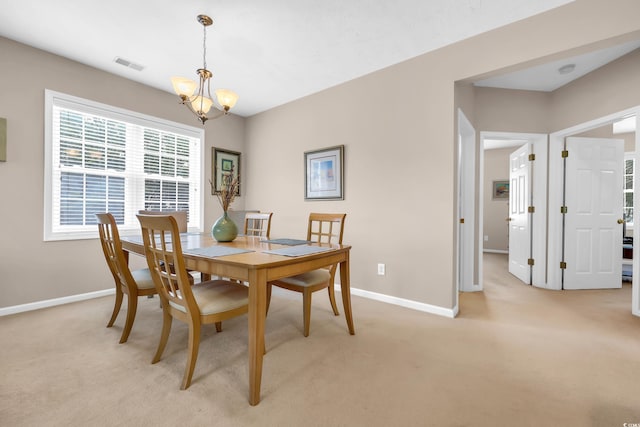 601 N Hillside Dr Unit 3926, North Myrtle Beach, SC 29582 - dining area featuring a chandelier and light carpet