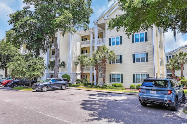 601 N Hillside Dr Unit 3926, North Myrtle Beach, SC 29582 - view of property featuring uncovered parking