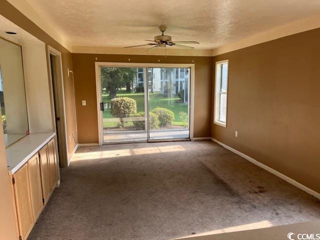 505 White River Dr Unit 25C, Myrtle Beach, SC 29579 - empty room with carpet floors and ceiling fan