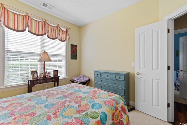 5712 Whistling Duck Dr, North Myrtle Beach, SC 29582 - bedroom with light colored carpet