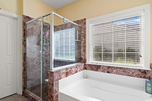 5712 Whistling Duck Dr, North Myrtle Beach, SC 29582 - bathroom featuring a garden tub, a shower stall, and tile patterned floors