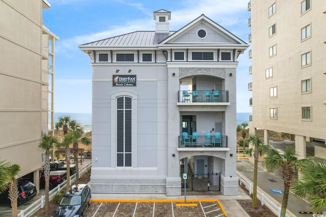5712 Whistling Duck Dr, North Myrtle Beach, SC 29582 - view of property featuring uncovered parking and a water view