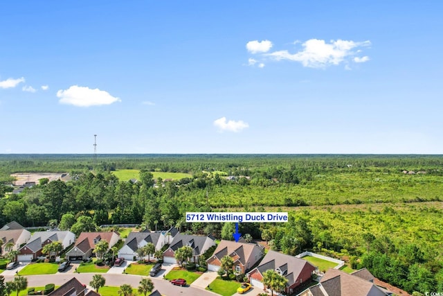 5712 Whistling Duck Dr, North Myrtle Beach, SC 29582 - aerial view of residential area featuring a forest
