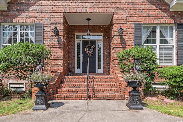 4691 Mill Pond Ct, Murrells Inlet, SC 29576 - view of exterior entry featuring brick siding