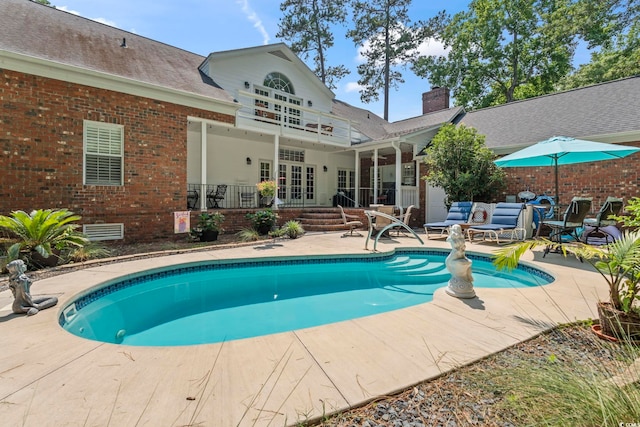 4691 Mill Pond Ct, Murrells Inlet, SC 29576 - swimming pool with a patio and french doors