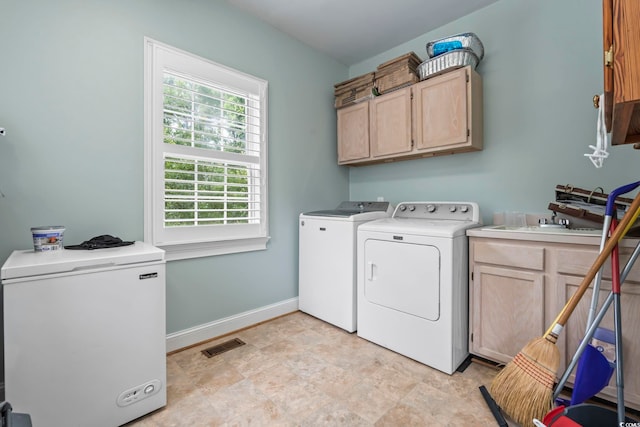 4691 Mill Pond Ct, Murrells Inlet, SC 29576 - washroom with cabinet space, washing machine and dryer, and stone finish floors