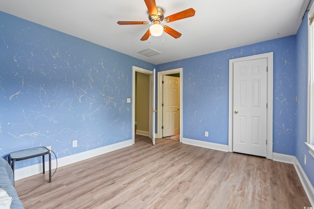 4691 Mill Pond Ct, Murrells Inlet, SC 29576 - unfurnished bedroom with wood finished floors and a ceiling fan
