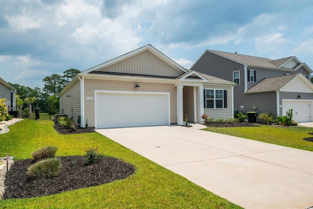 964 Irving Dr, Little River, SC 29566 - view of front of house featuring concrete driveway and an attached garage