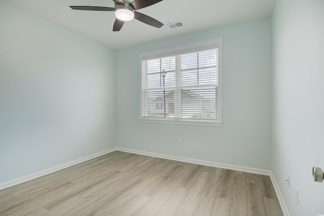 964 Irving Dr, Little River, SC 29566 - empty room featuring light wood finished floors and a ceiling fan