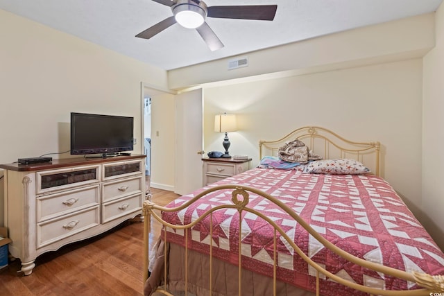 5515 N Ocean Blvd Unit 308, Myrtle Beach, SC 29577 - bedroom with wood finished floors and ceiling fan