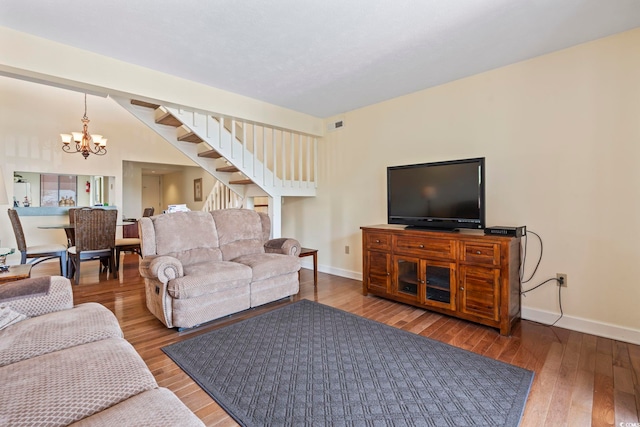 5515 N Ocean Blvd Unit 308, Myrtle Beach, SC 29577 - living room with a chandelier, stairs, and hardwood / wood-style floors