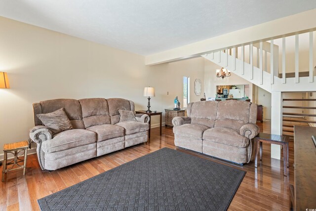 5515 N Ocean Blvd Unit 308, Myrtle Beach, SC 29577 - living area featuring stairway, wood finished floors, and a chandelier