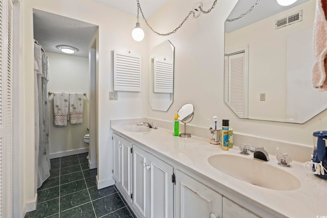 5515 N Ocean Blvd Unit 308, Myrtle Beach, SC 29577 - full bath featuring double vanity, tile patterned flooring, and a closet