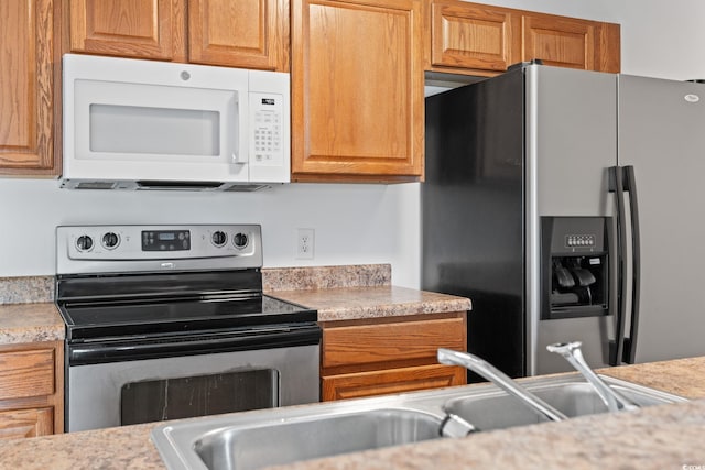 2257 Andover Dr Unit A, Surfside Beach, SC 29575 - kitchen featuring stainless steel appliances and light countertops