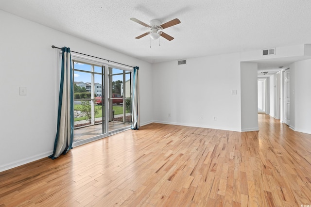2257 Andover Dr Unit A, Surfside Beach, SC 29575 - unfurnished room with ceiling fan, light wood-style floors, and a textured ceiling