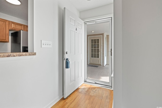 2257 Andover Dr Unit A, Surfside Beach, SC 29575 - corridor featuring light wood-style flooring and baseboards
