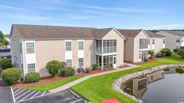 2257 Andover Dr Unit A, Surfside Beach, SC 29575 - view of building exterior featuring uncovered parking
