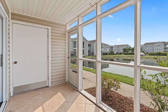 2257 Andover Dr Unit A, Surfside Beach, SC 29575 - unfurnished sunroom with a water view and a residential view