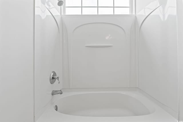 2257 Andover Dr Unit A, Surfside Beach, SC 29575 - bathroom featuring healthy amount of natural light and tub / shower combination